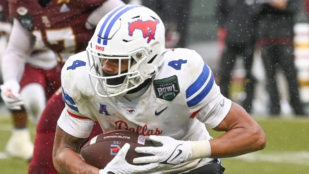 SMU running back Jaylan Knighton runs against Boston College